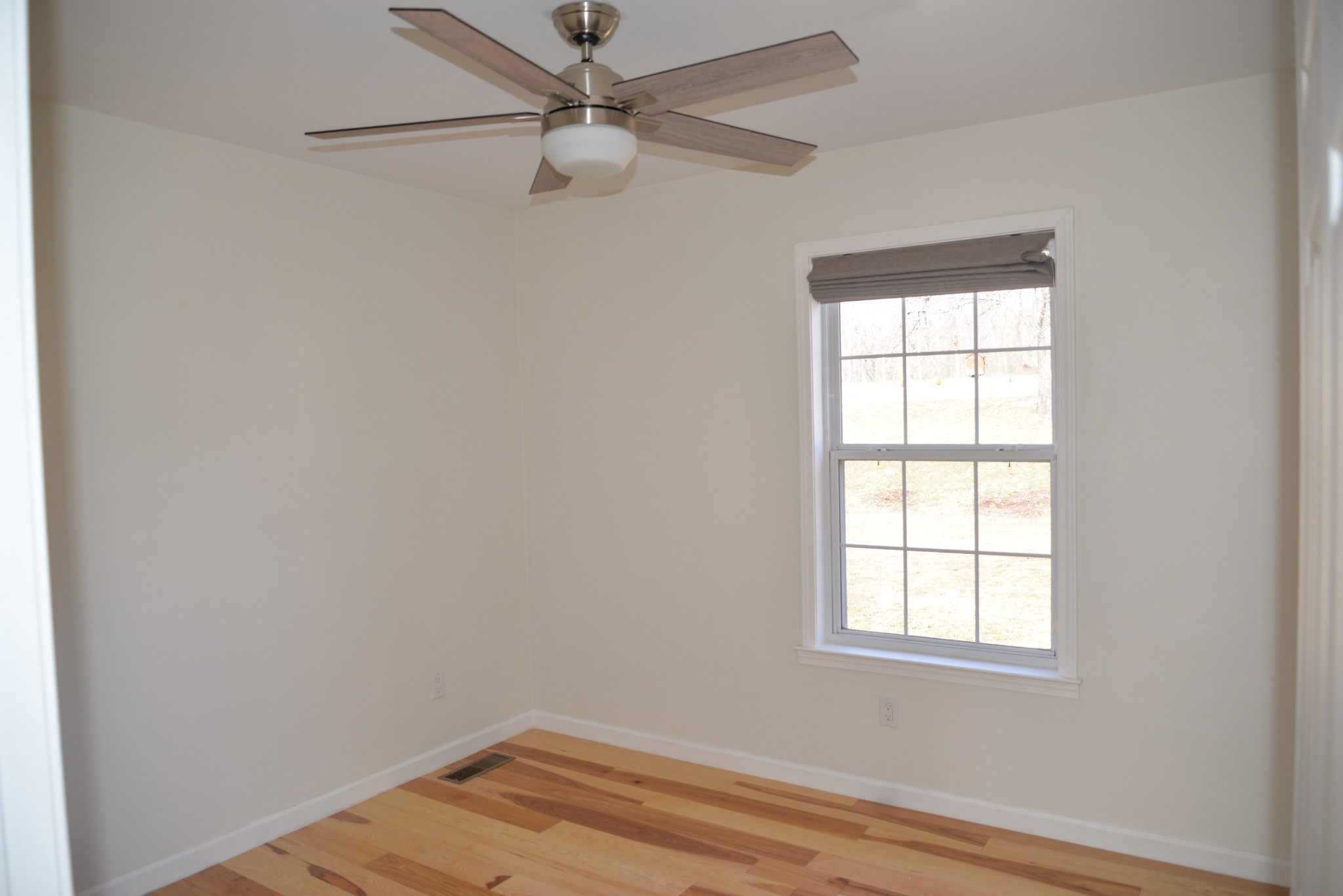 1429 Dividing Ridge Road Goodlettsville, TN 37072 - Photo 18 of 30 an empty room with a window and ceiling fan