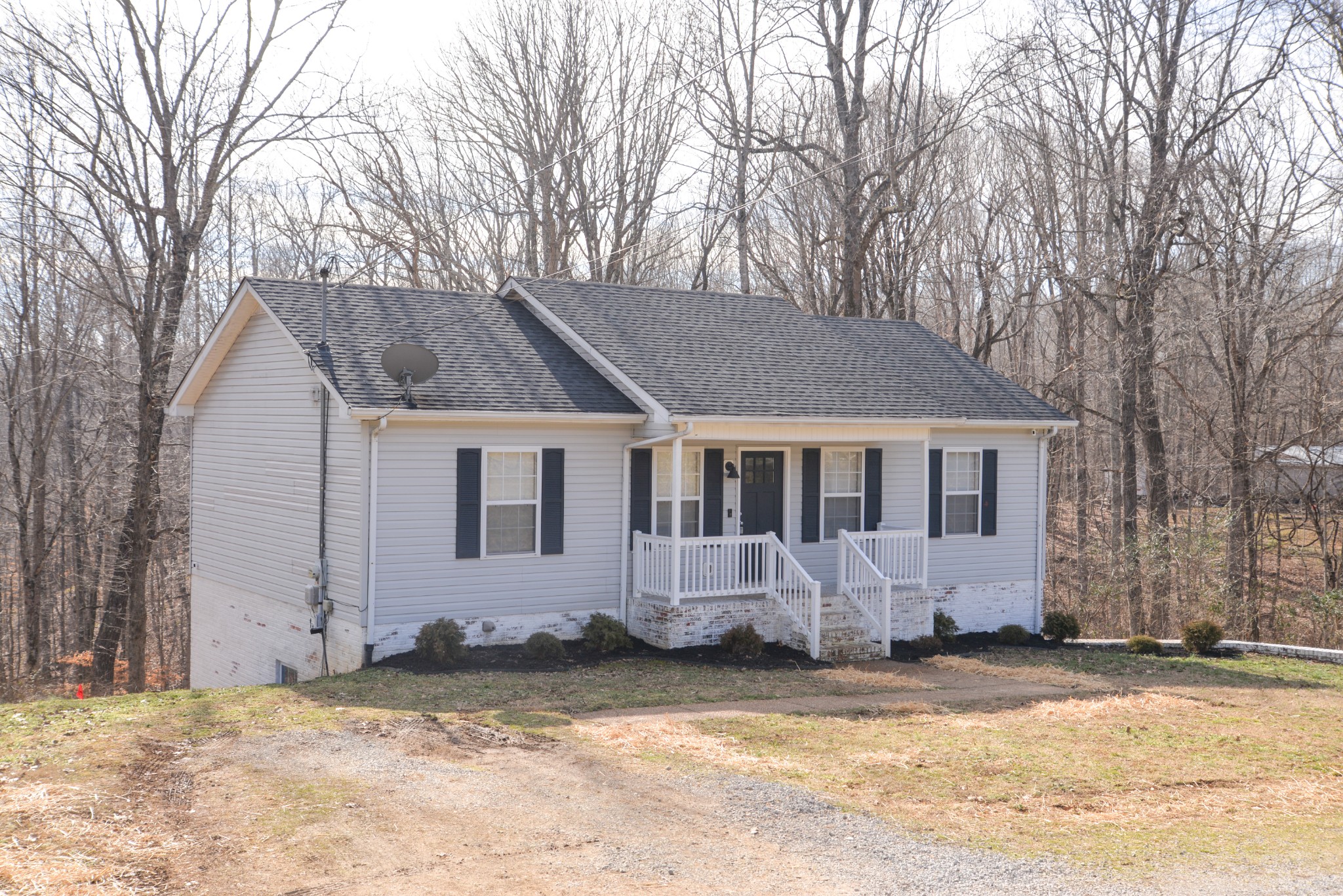 1429 Dividing Ridge Road Goodlettsville, TN 37072 - Photo 2 of 30 a front view of a house with a yard
