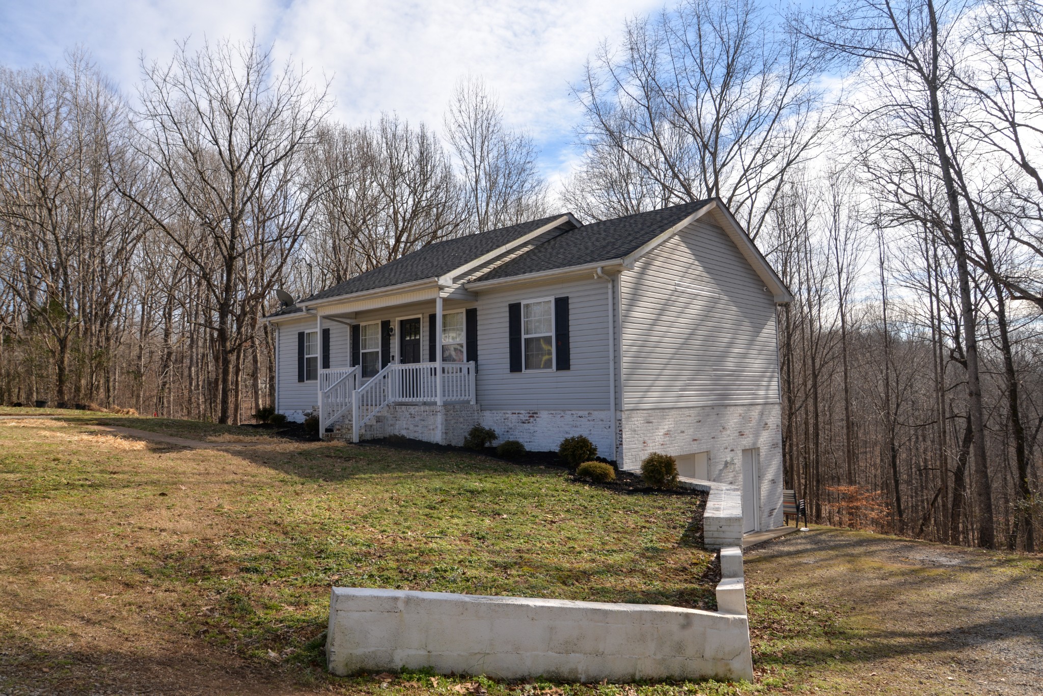 1429 Dividing Ridge Road Goodlettsville, TN 37072 - Photo 3 of 30 a front view of a house with a yard
