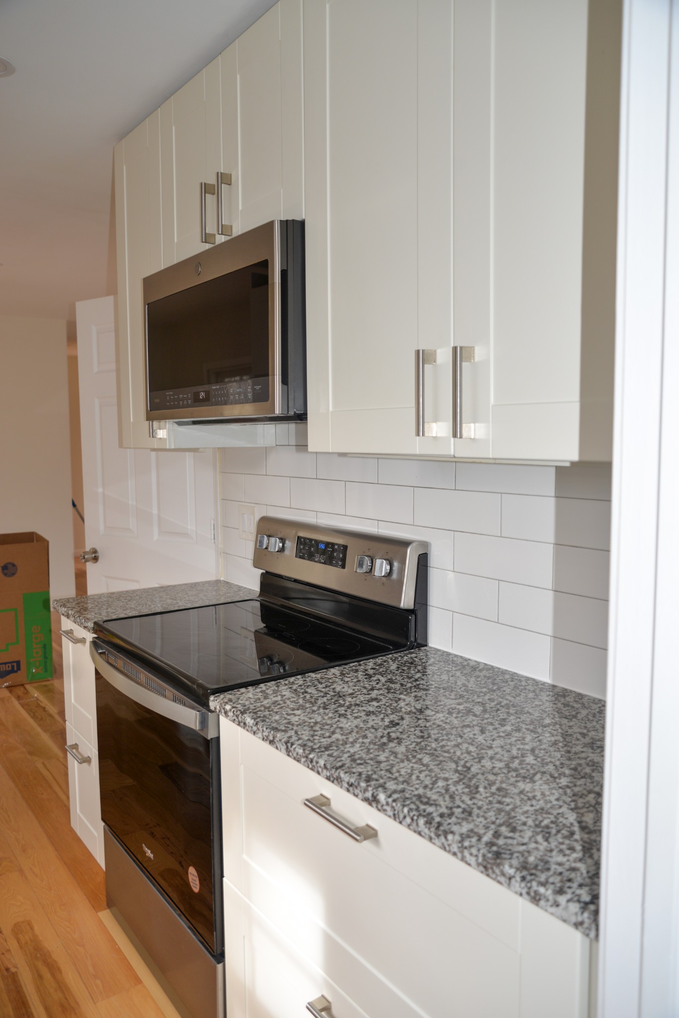 1429 Dividing Ridge Road Goodlettsville, TN 37072 - Photo 10 of 30 a kitchen with microwave stove and cabinets
