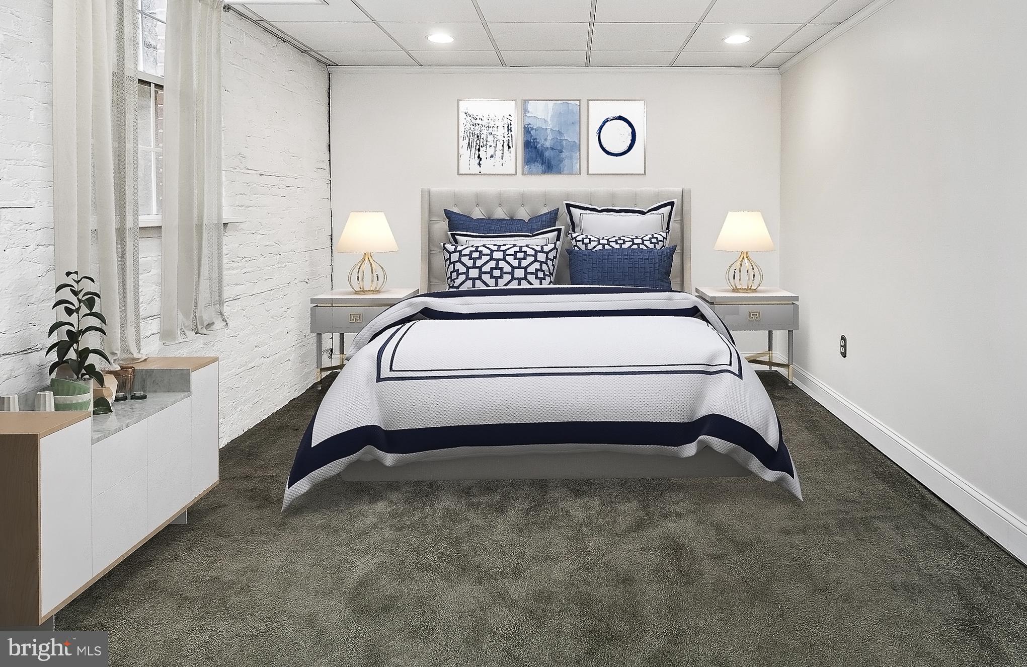 221 Ridgemede Road, Unit 204 Baltimore, MD 21210 - Photo 15 of 18 Warm Master Bedroom to Rest and Relax