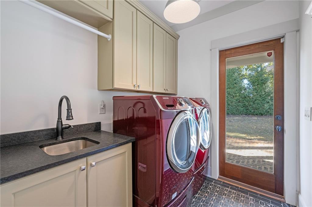 213 Ohm Avenue Avondale Estates, GA 30002 - Photo 12 of 43 a utility room with sink dryer and washer