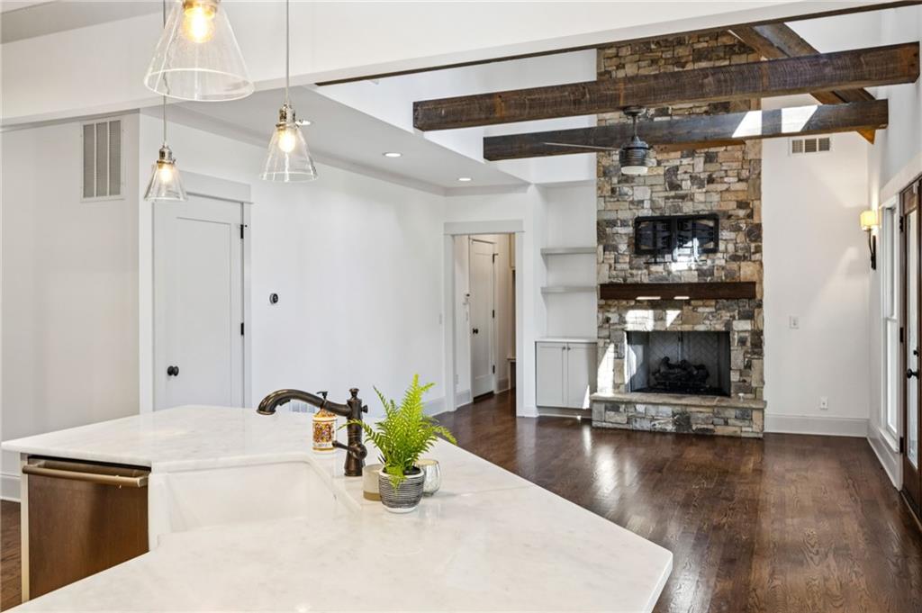 213 Ohm Avenue Avondale Estates, GA 30002 - Photo 17 of 43 a view of a living room and chandelier