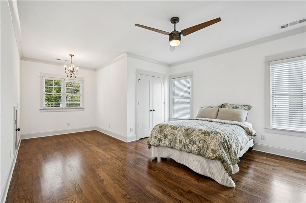 213 Ohm Avenue Avondale Estates, GA 30002 - Photo 23 of 43 a bedroom with a bed and a window