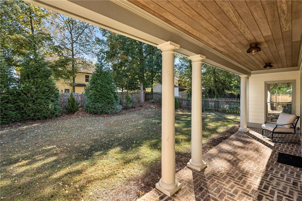 213 Ohm Avenue Avondale Estates, GA 30002 - Photo 31 of 43 a view of a porch with furniture and garden