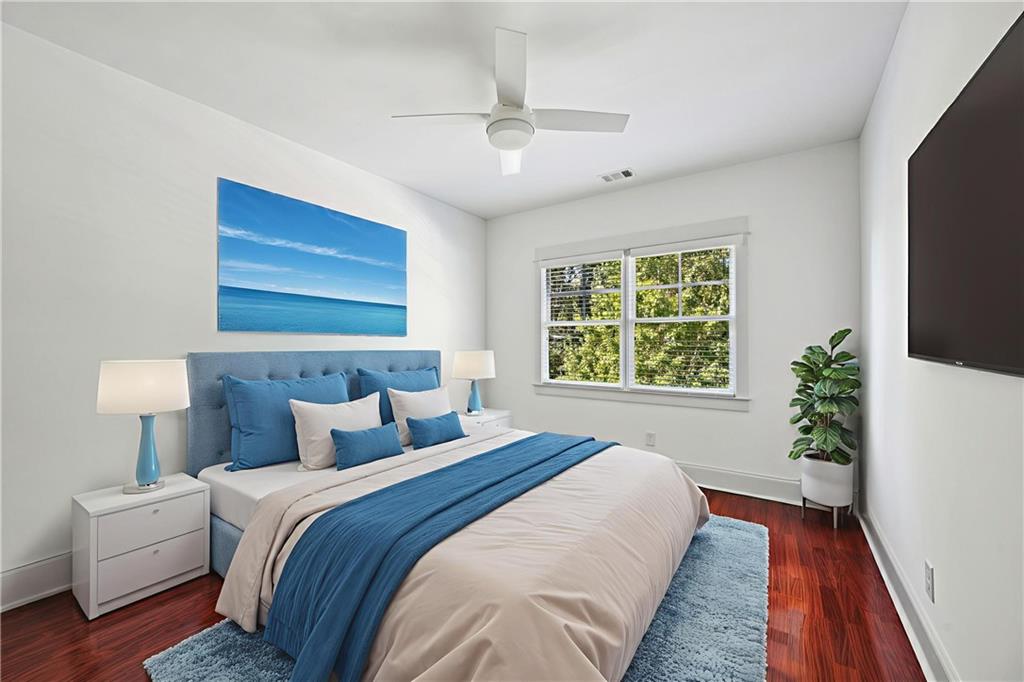 213 Ohm Avenue Avondale Estates, GA 30002 - Photo 36 of 43 a bedroom with bed and a window