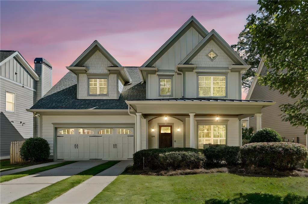 213 Ohm Avenue Avondale Estates, GA 30002 - Photo 38 of 43 a front view of a house with a yard