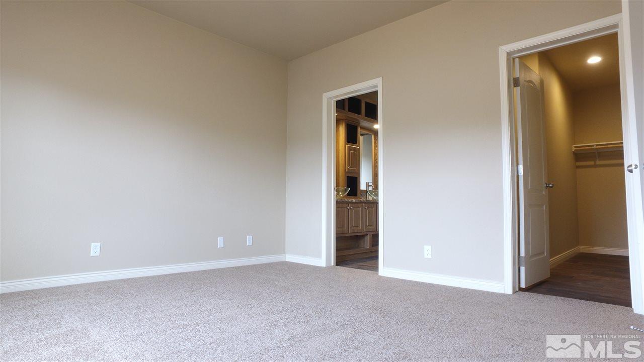 3920 Goldfinch Drive Reno, NV 89508 - Photo 12 of 16 an empty room with closet and a bathroom