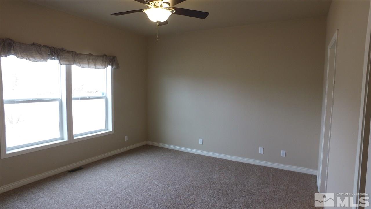 3920 Goldfinch Drive Reno, NV 89508 - Photo 14 of 16 an empty room with a window
