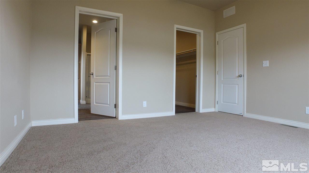 3920 Goldfinch Drive Reno, NV 89508 - Photo 7 of 16 an empty room with closet and a bathroom