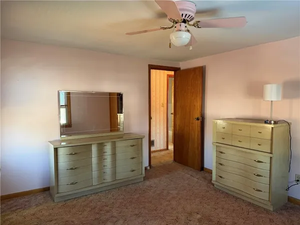 a view of a livingroom with furniture