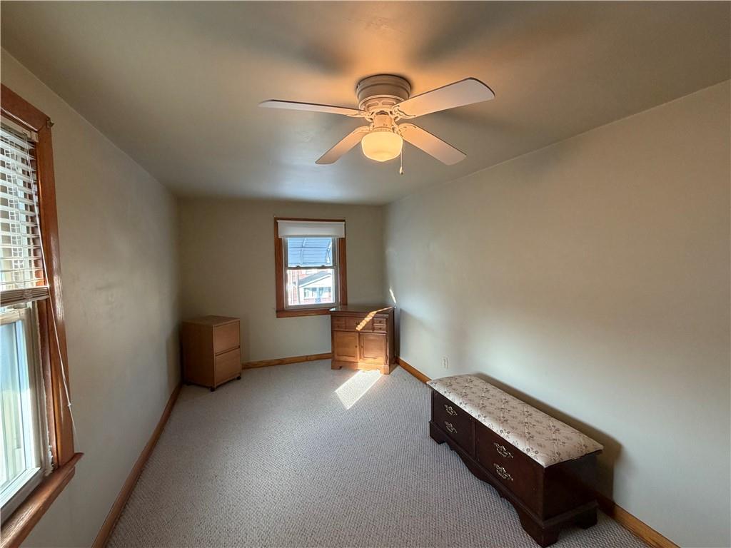 508 Tamplin Street Sharon, PA 16146 - Photo 18 of 29 a room with a window and a chandelier