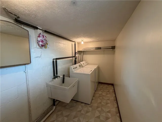 a view of storage and utility room with furniture