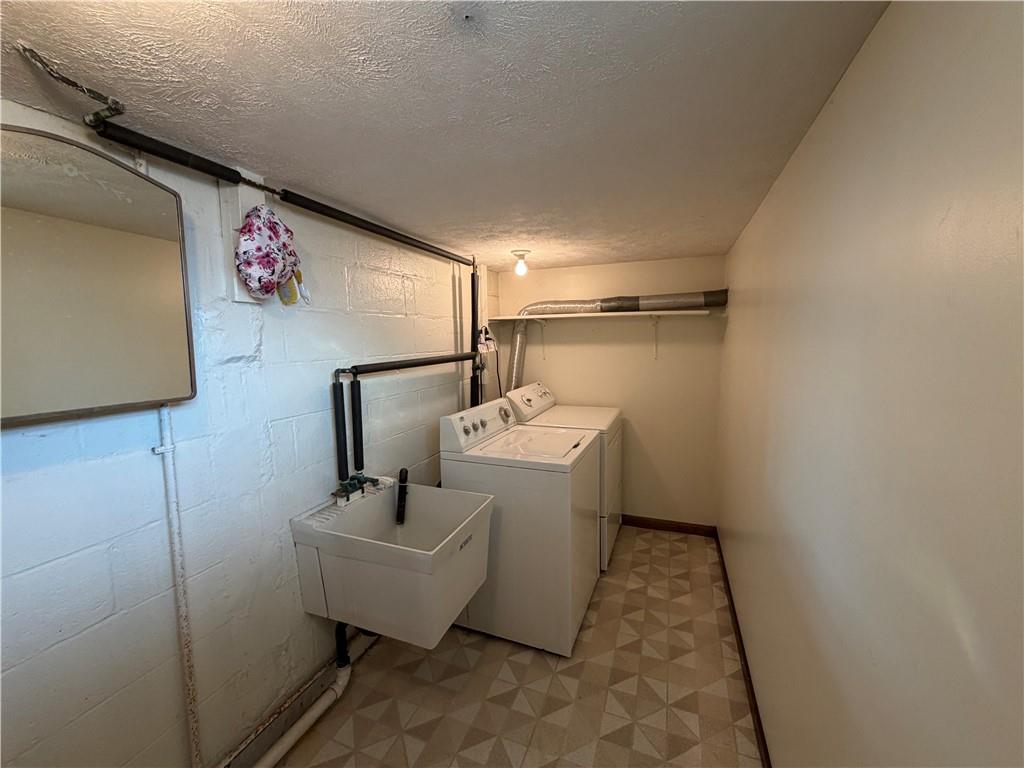 508 Tamplin Street Sharon, PA 16146 - Photo 27 of 29 a bathroom with a sink and mirror