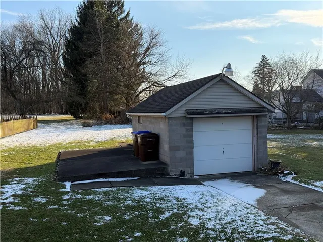 a view of a house with backyard