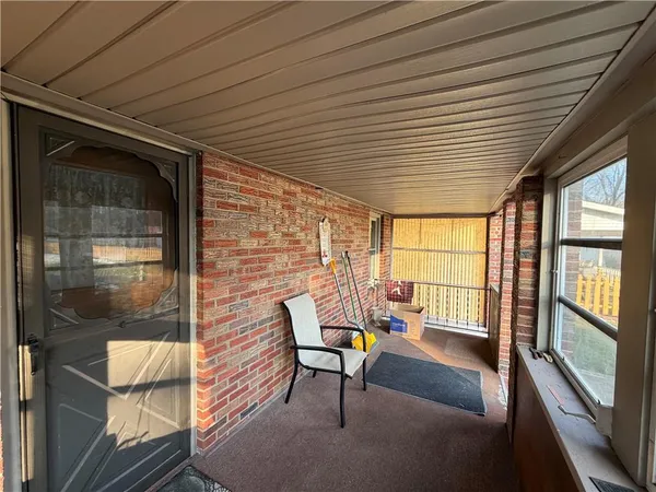 a porch with seating space