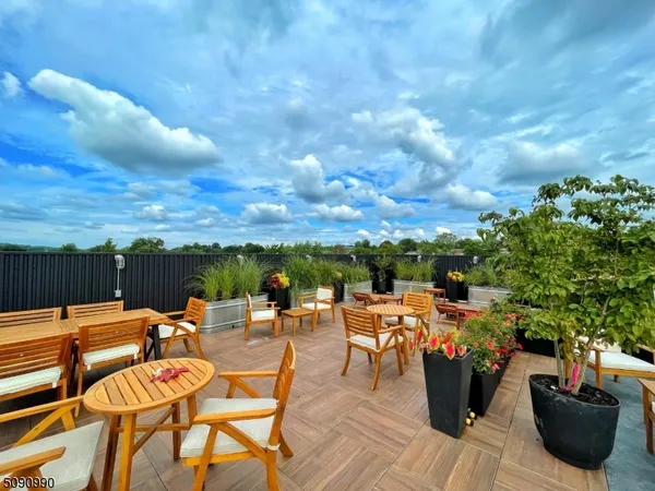 a view of a terrace with furniture
