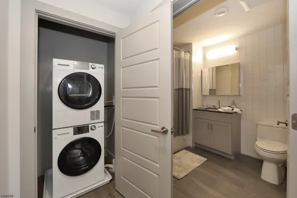 a kitchen with a washer and dryer