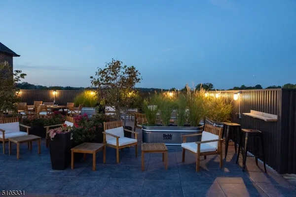 a view of a tables and chairs in patio