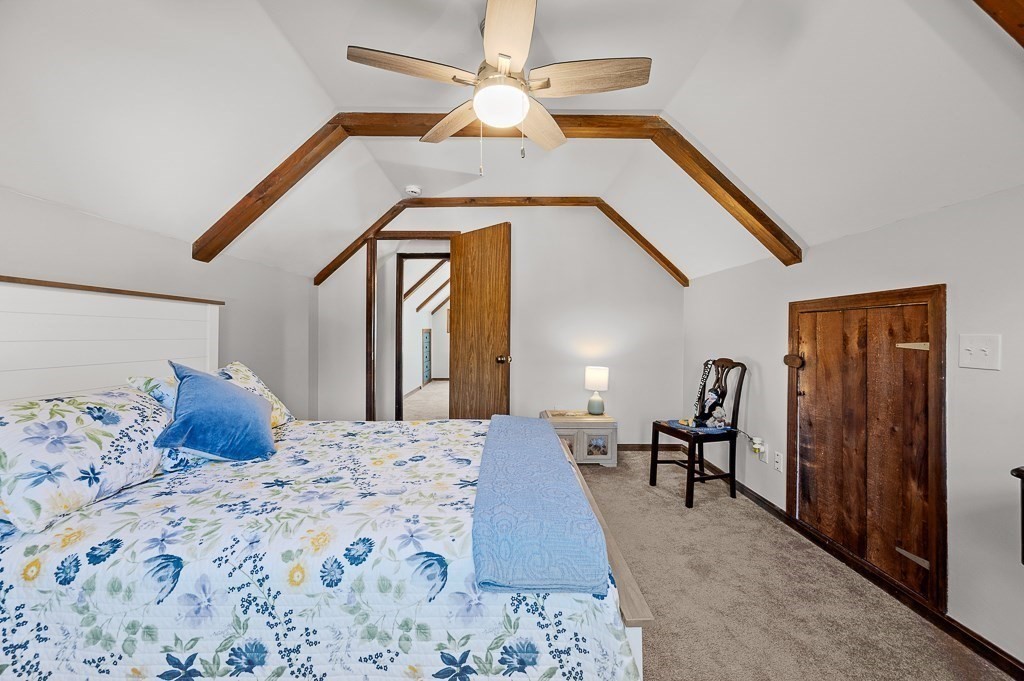 62 Larned Road Oxford, MA 01540 - Photo 17 of 42 a bedroom with a bed and a dresser with rug