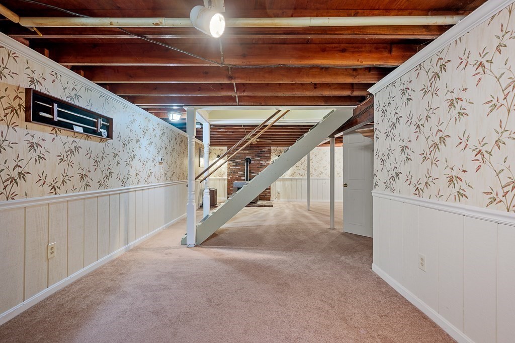 62 Larned Road Oxford, MA 01540 - Photo 20 of 42 a view of an empty room with wooden walls