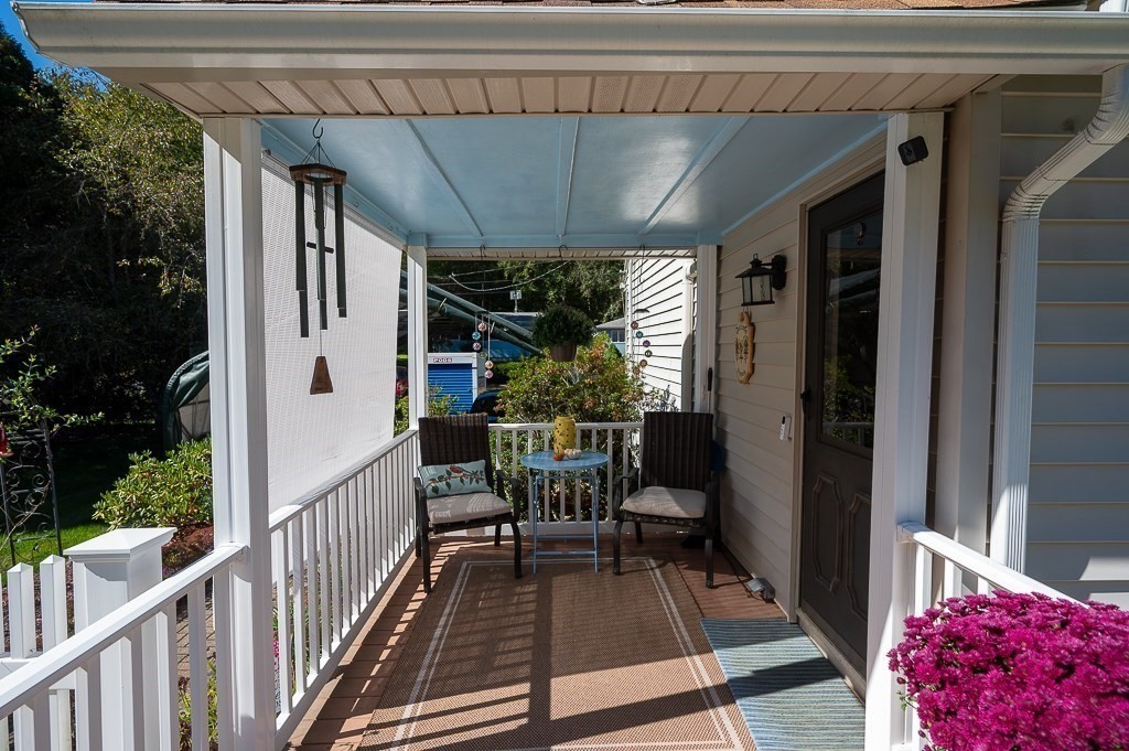 62 Larned Road Oxford, MA 01540 - Photo 26 of 42 a view of balcony with chairs and potted plant