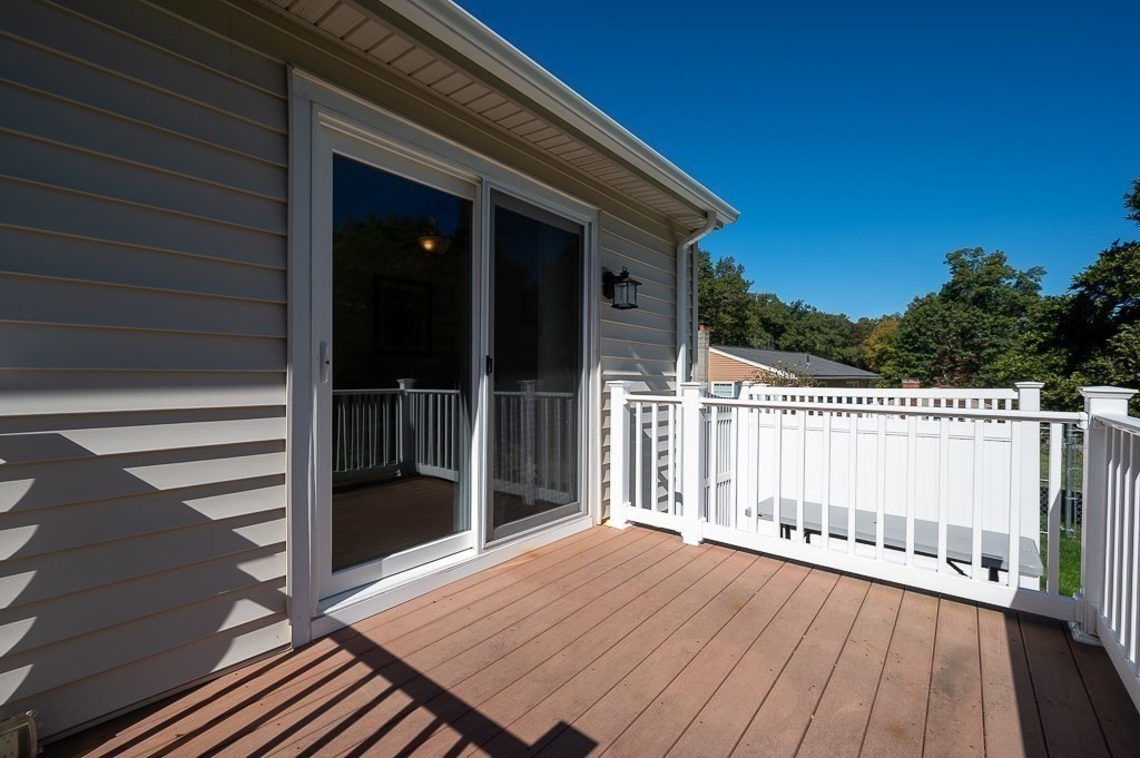 62 Larned Road Oxford, MA 01540 - Photo 27 of 42 a terrace with wooden floor and fence