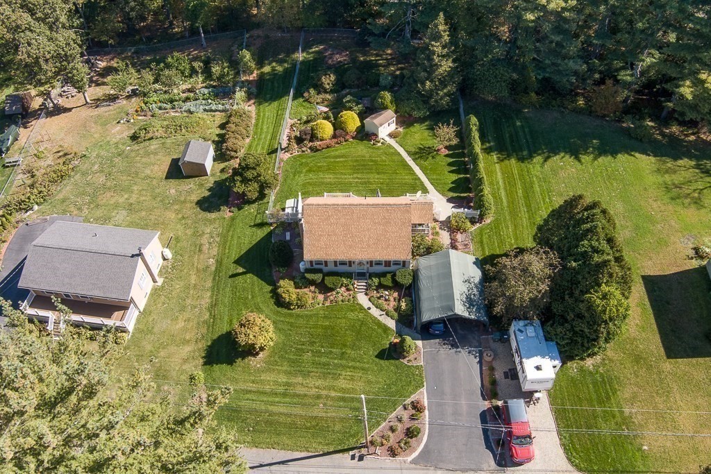 62 Larned Road Oxford, MA 01540 - Photo 36 of 42 an aerial view of a house with a yard and swimming pool