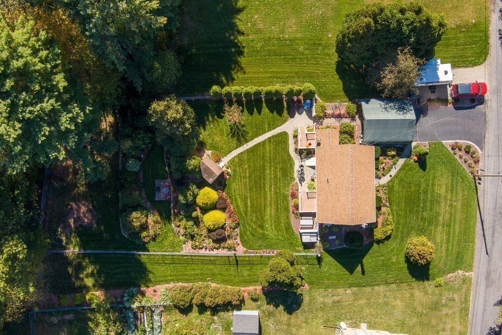 62 Larned Road Oxford, MA 01540 - Photo 39 of 42 an aerial view of a house having a yard