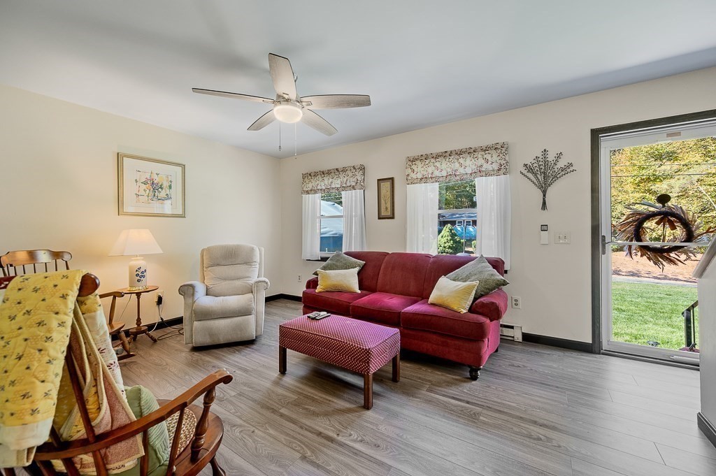 62 Larned Road Oxford, MA 01540 - Photo 5 of 42 a living room with furniture and a wooden floor