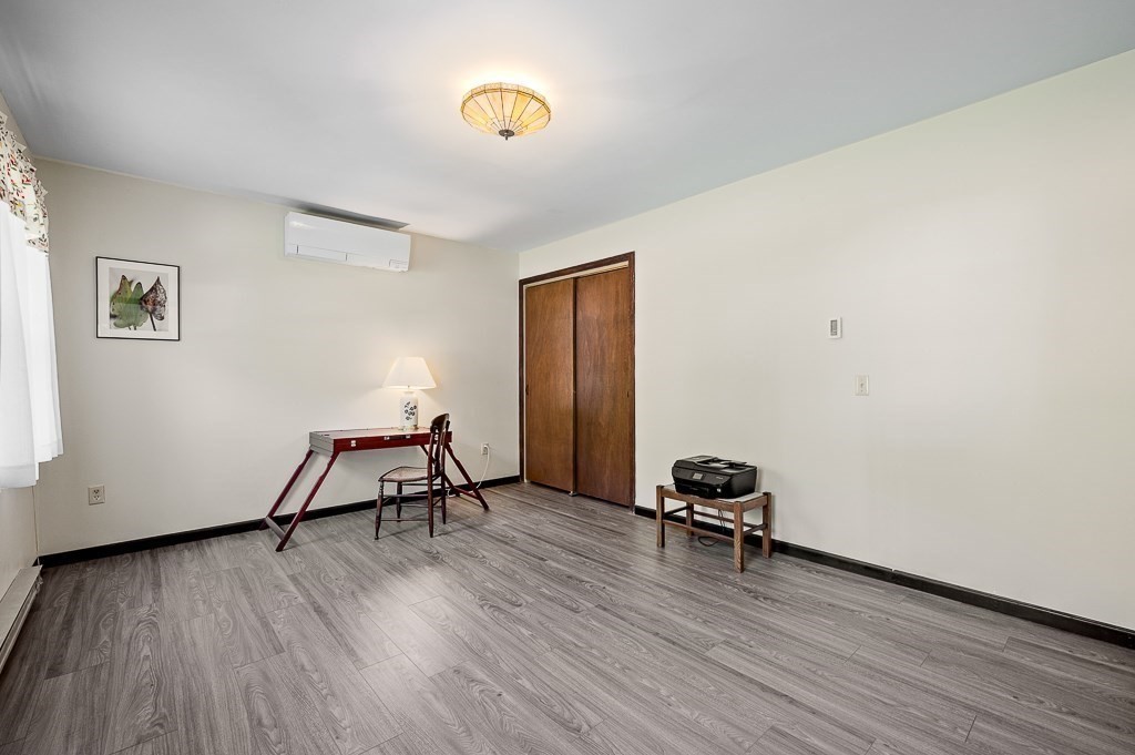 62 Larned Road Oxford, MA 01540 - Photo 8 of 42 a room with a table and a workspace