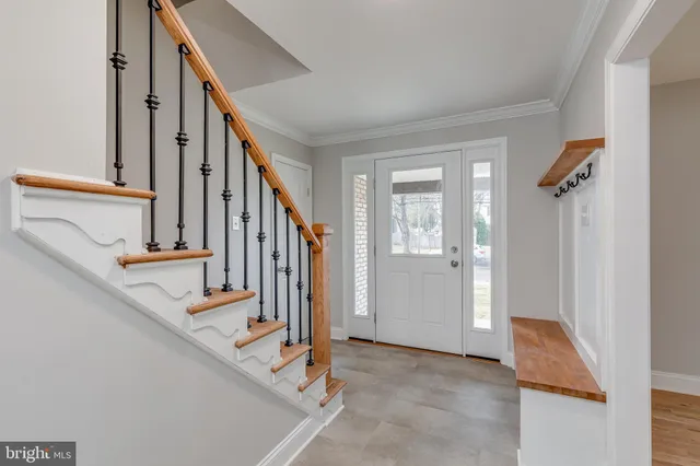 a view of an entryway with staircase
