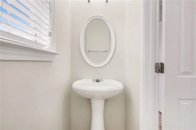 a bathroom with a sink a toilet and a bathtub