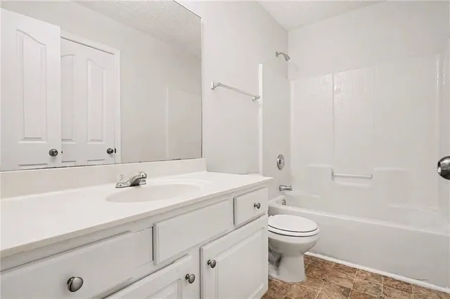 a view of a house with a patio