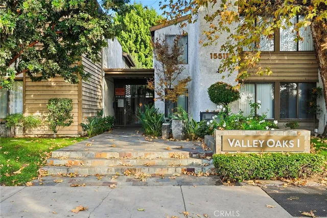 a front view of a building with garden