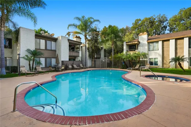 a view of a house with swimming pool
