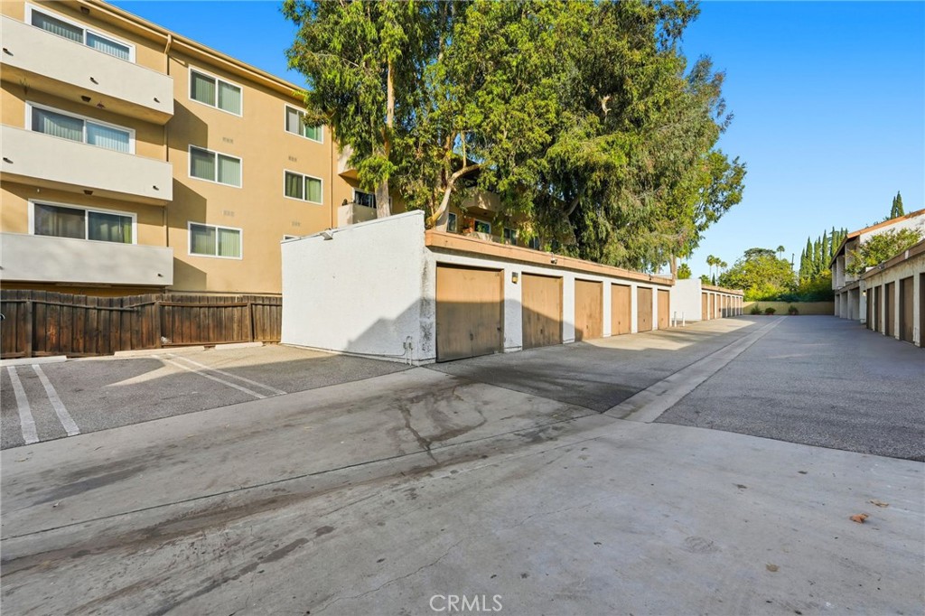 15511 Sherman Way, Unit 19 Van Nuys, CA 91406 - Photo 29 of 31 a view of a house with a yard