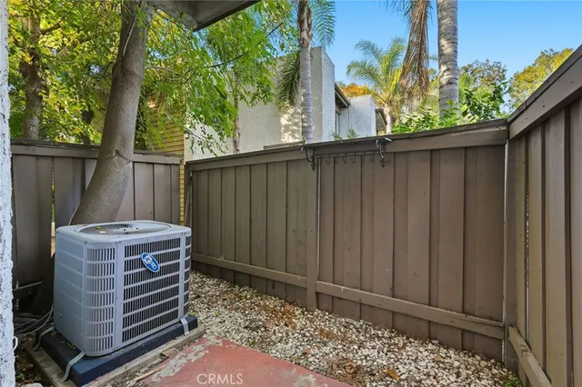 a view of a backyard with a chair