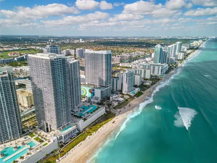 a view of a city with tall buildings