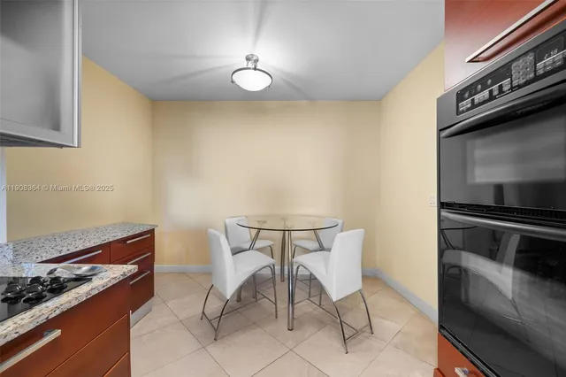 a kitchen with a stove and a microwave