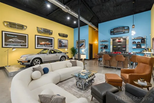 a view of a livingroom with furniture and an empty room