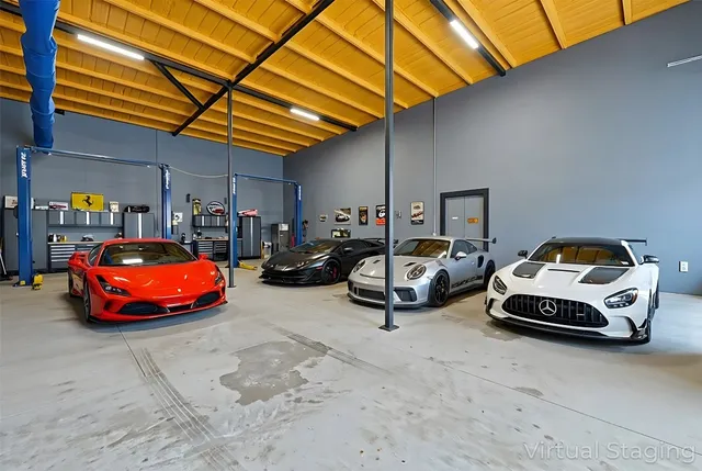 a living room with furniture a rug and a chandelier