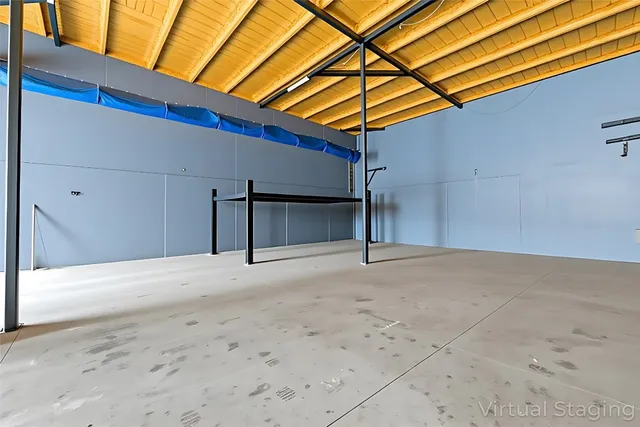 a car parked in front of a garage