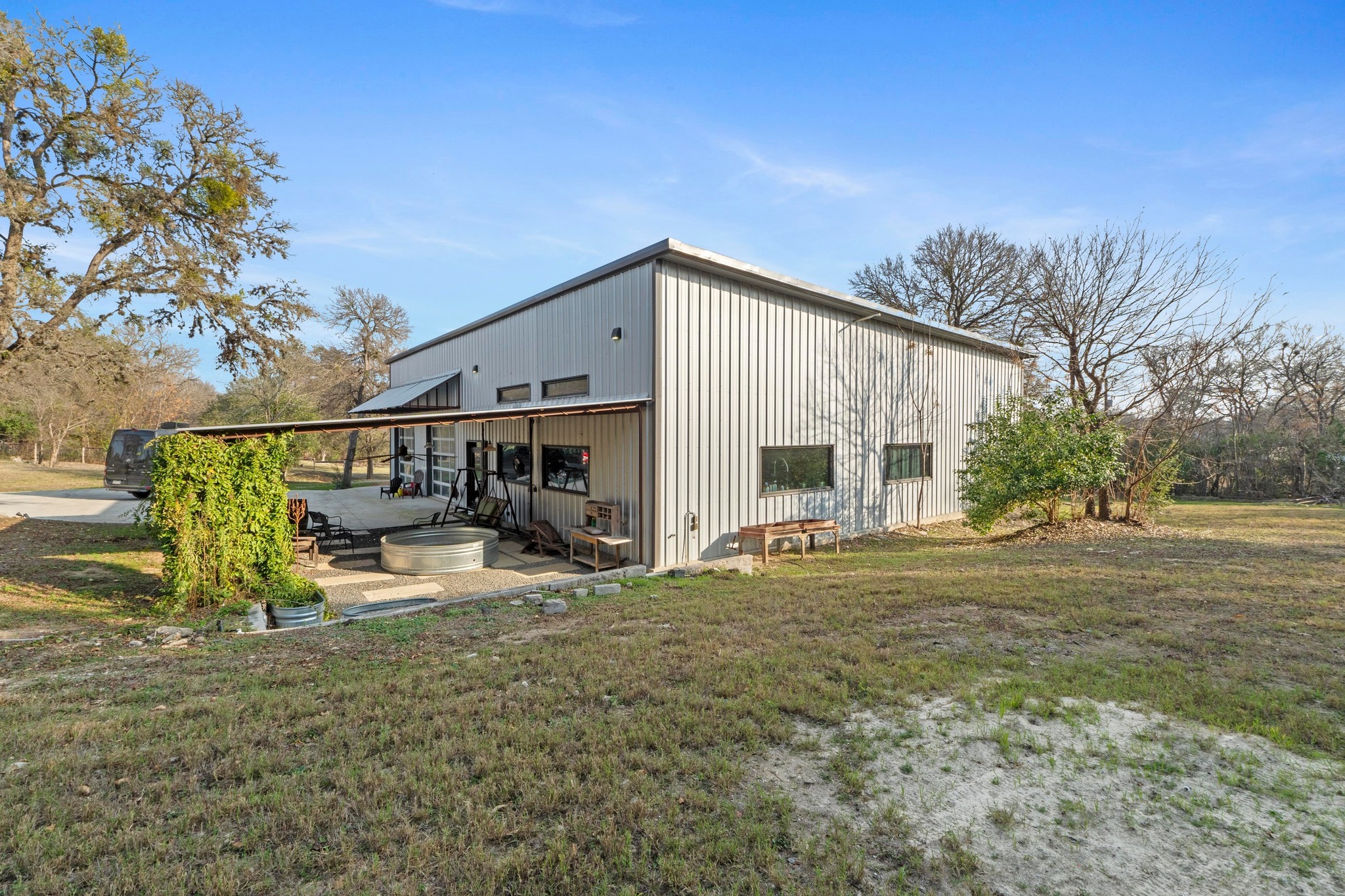 12302 Bethel Church Road Manchaca, TX 78652 - Photo 34 of 35 a view of a house with backyard