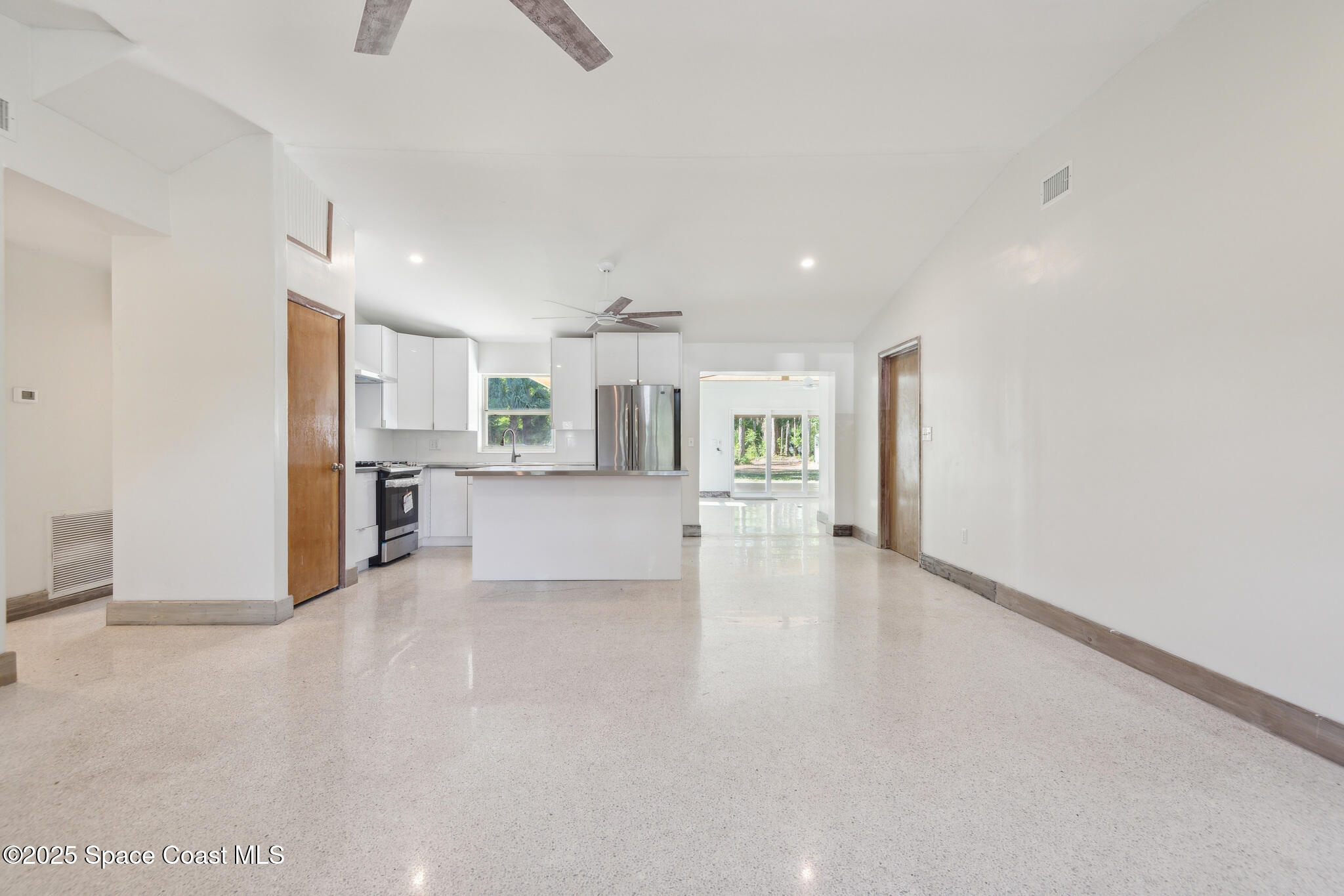 8575 Sheridan Road Melbourne, FL 32904 - Photo 4 of 30 09_8575_Sheridan_Rd_Melbourne_FL_32904_U