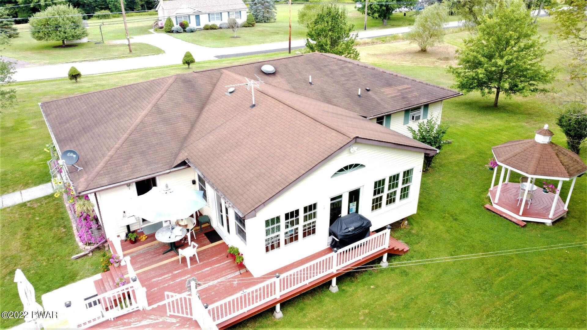 762 Milanville Road Beach Lake, PA 18405 - Photo 7 of 41 Rear deck ready for your guests