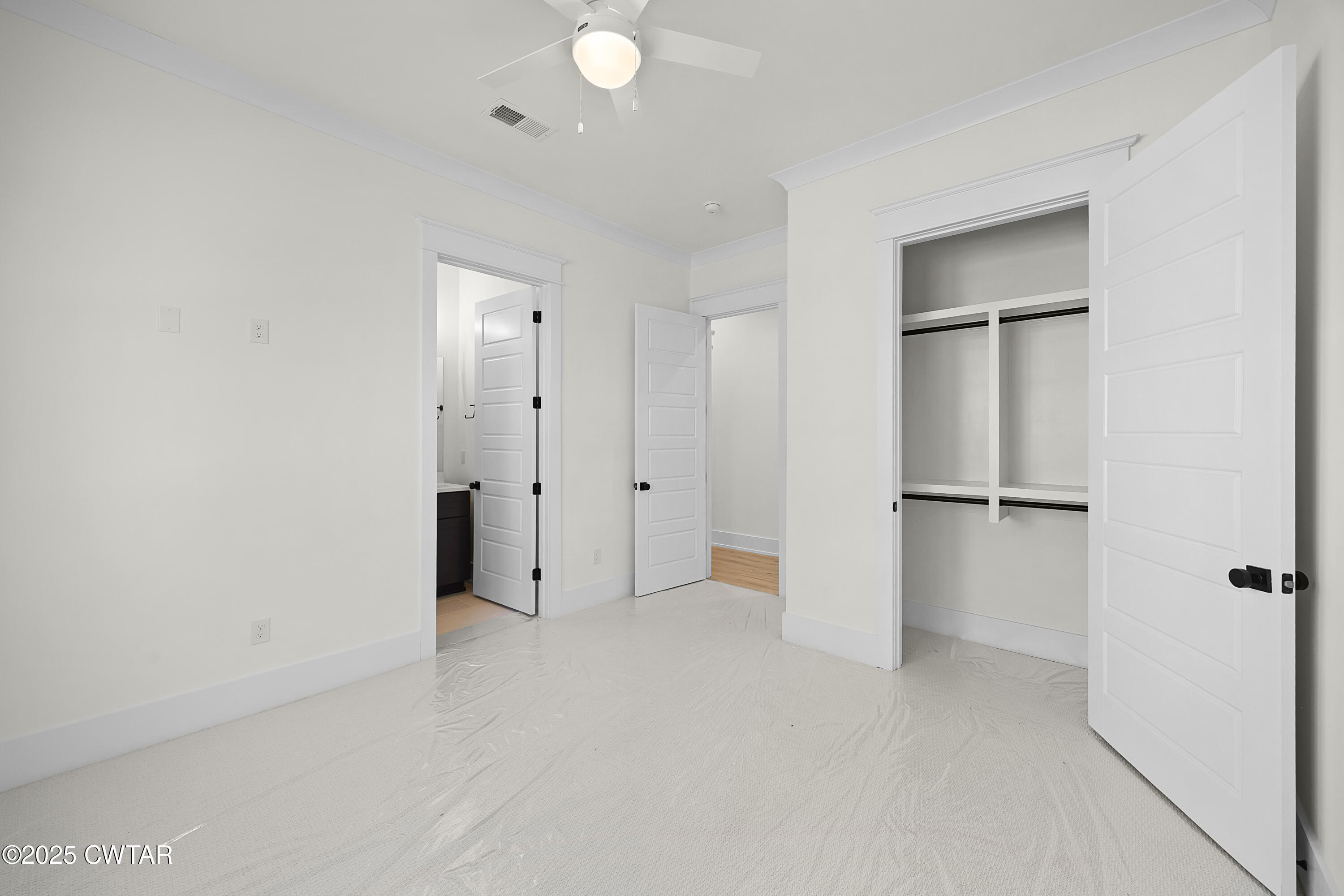 219 Clay Street Jackson, TN 38301 - Photo 11 of 25 an empty room with closet area