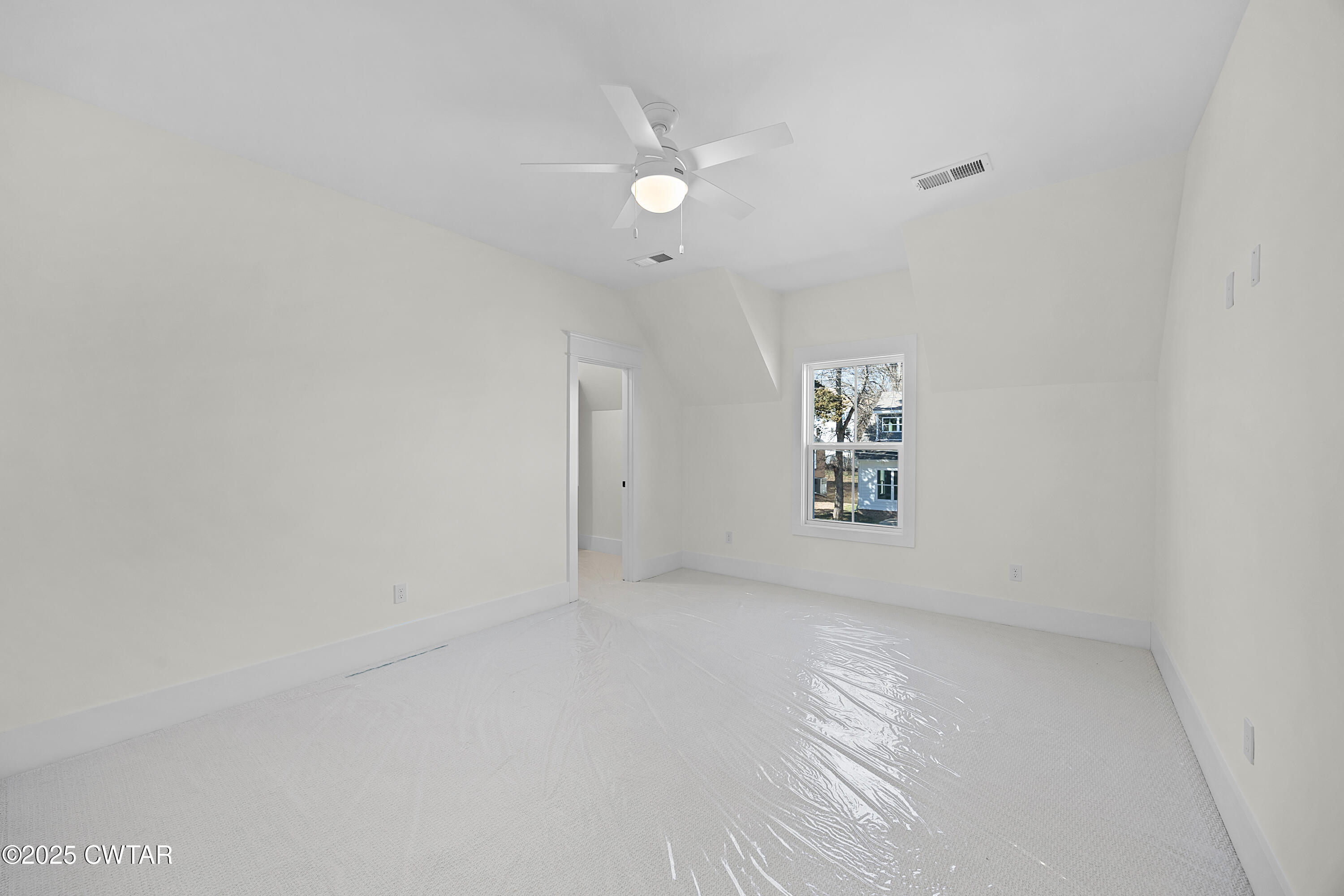 219 Clay Street Jackson, TN 38301 - Photo 16 of 25 a view of an empty room with a window