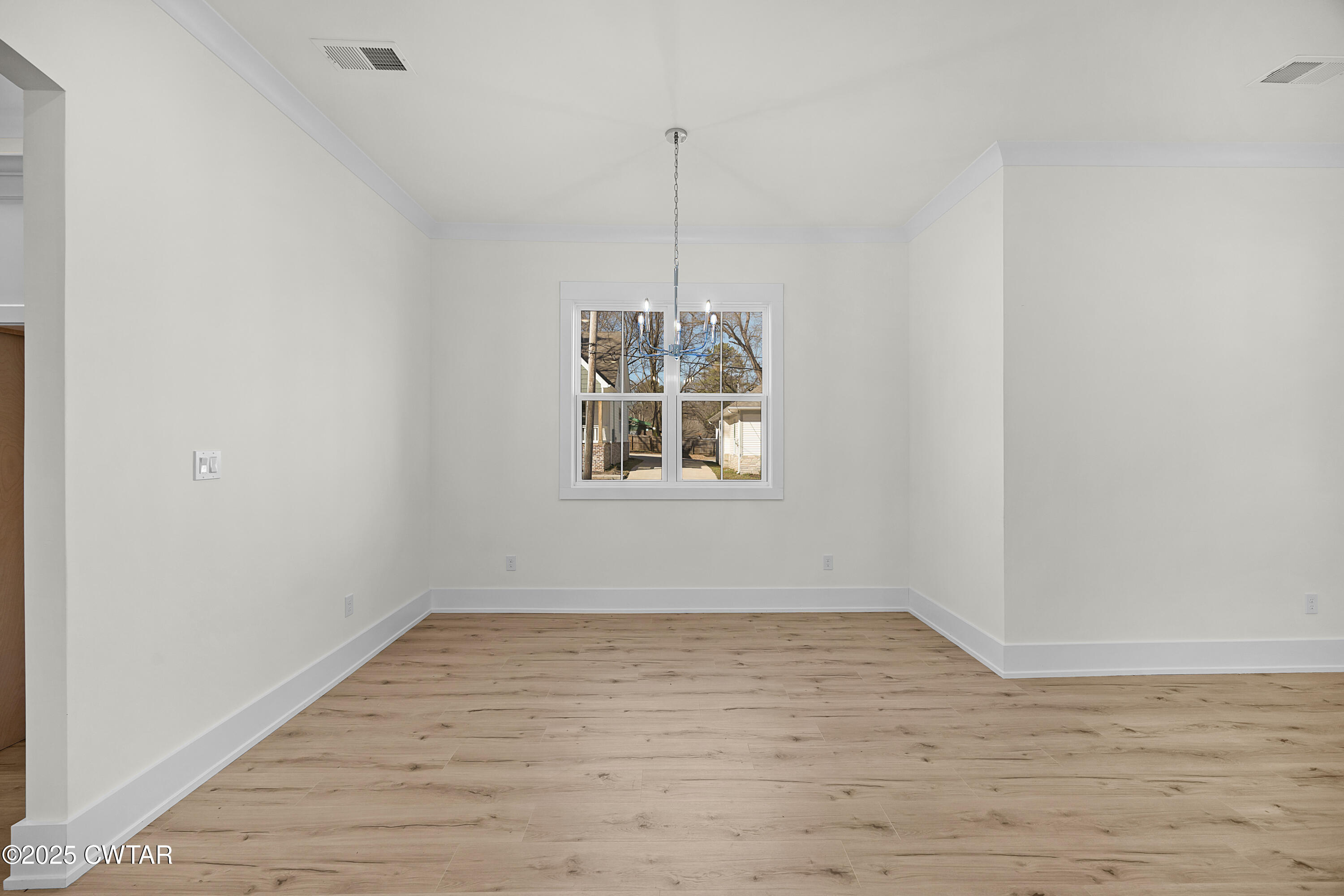 219 Clay Street Jackson, TN 38301 - Photo 5 of 25 a view of an empty room with window