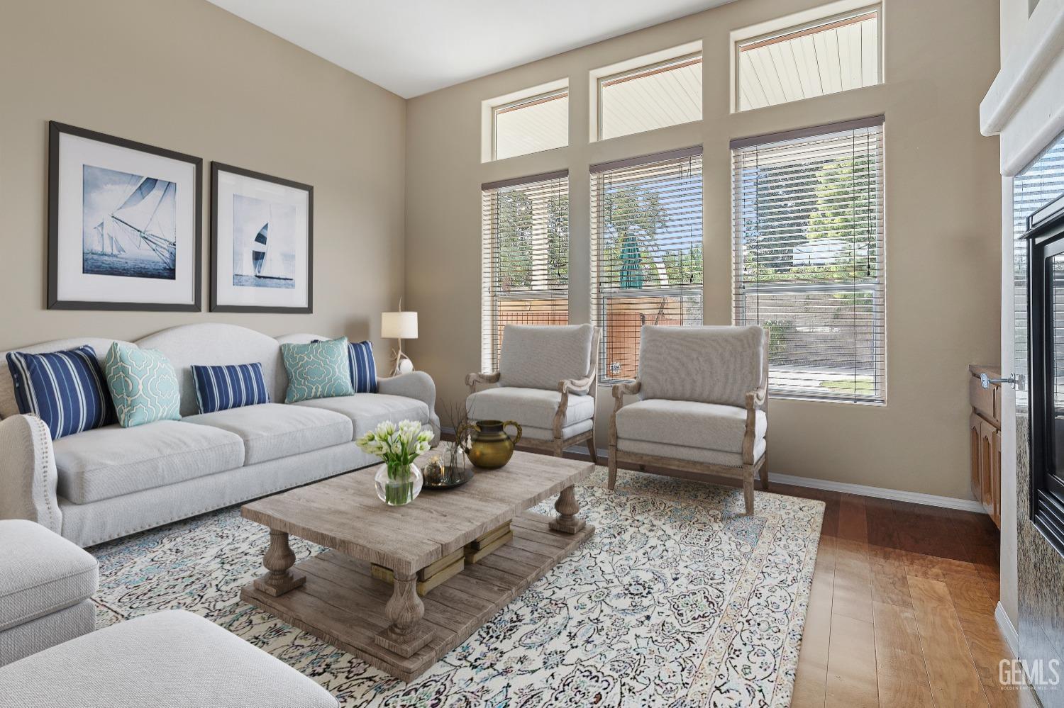 Undisclosed Address Bakersfield, CA 93306 - Photo 11 of 41 a living room with furniture and a large window